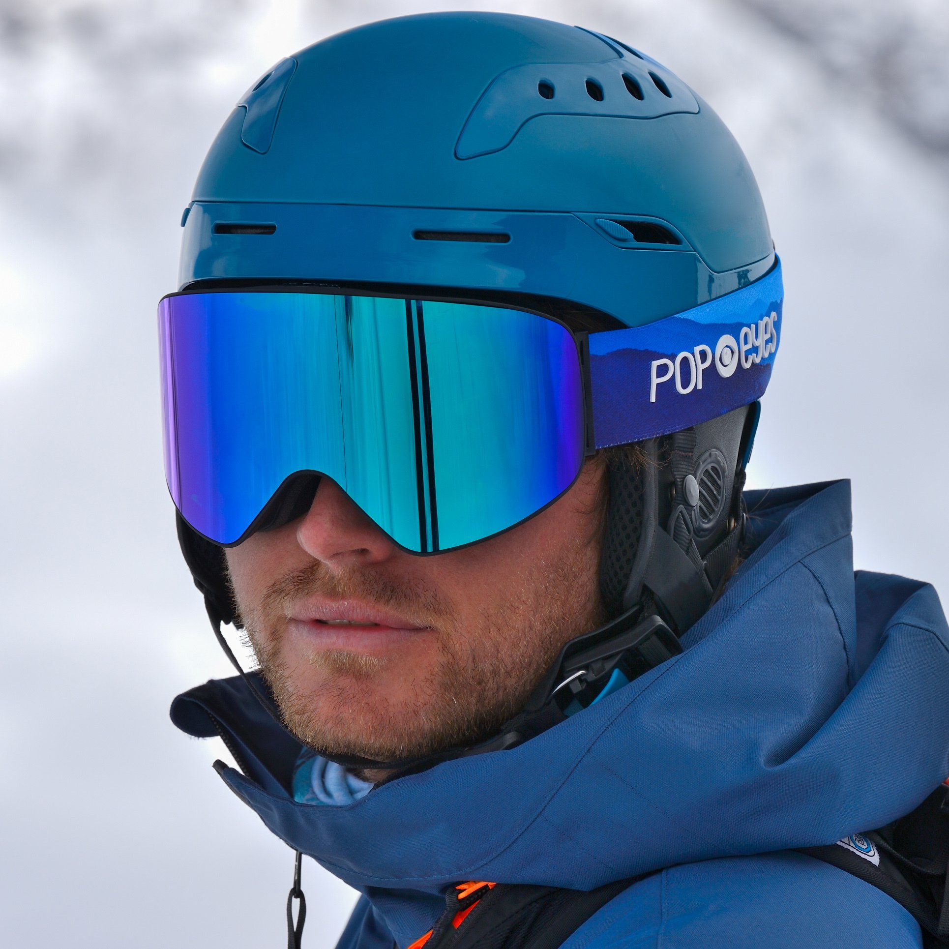 Ski goggles LARRY Photochromatic Blue Real Mountains – men’s OTG ski goggles with photochromatic CAT 1-3 lens | POP EYES