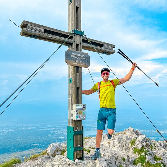 POP EYES athlete Manuel on top of a mountain wearing sunglasses EDDY